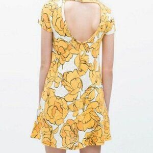 Bold Yellow Floral Mini Dress – Soft Knit with Open Scoop Back & Short Sleeves